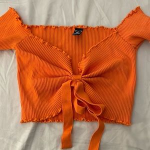 Orange ribbed short sleeved crop top